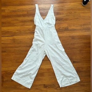 I am selling a jumpsuit that is white and from The Reset.